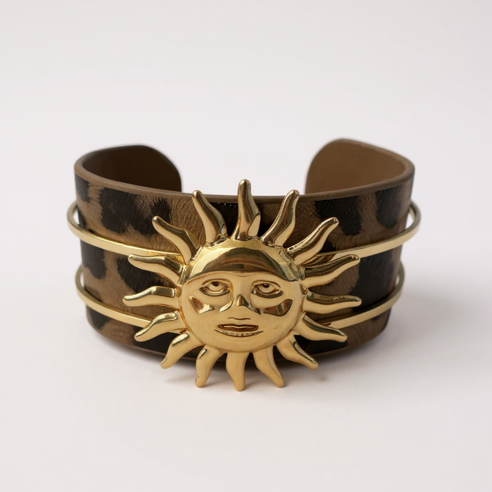 Bracelet manchette doré avec motif soleil et imprimé léopard