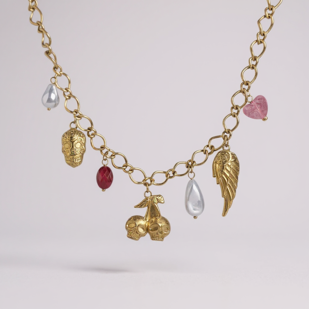 Collier Liora – collier doré rock chic avec têtes de mort et aile | bijoux acier inoxydable | Gaou Bijoux