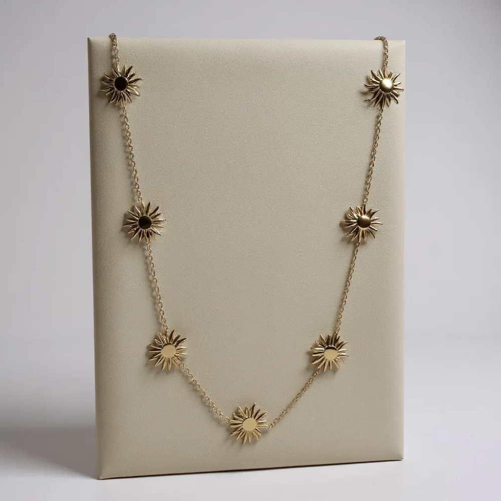 Sautoir doré en acier inoxydable avec pendentifs soleil