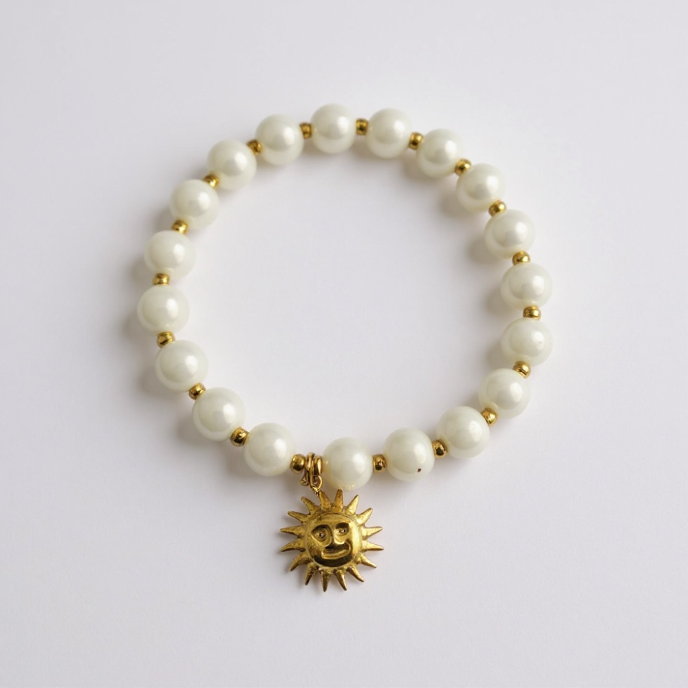 Bracelet perles nacrées charms dorés (soleil, fleur) | bijoux acier inoxydable | Gaou Bijoux