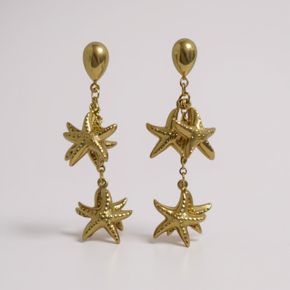 Boucles d’oreilles étoiles de mer dorées en acier inoxydable au design marin et lumineux