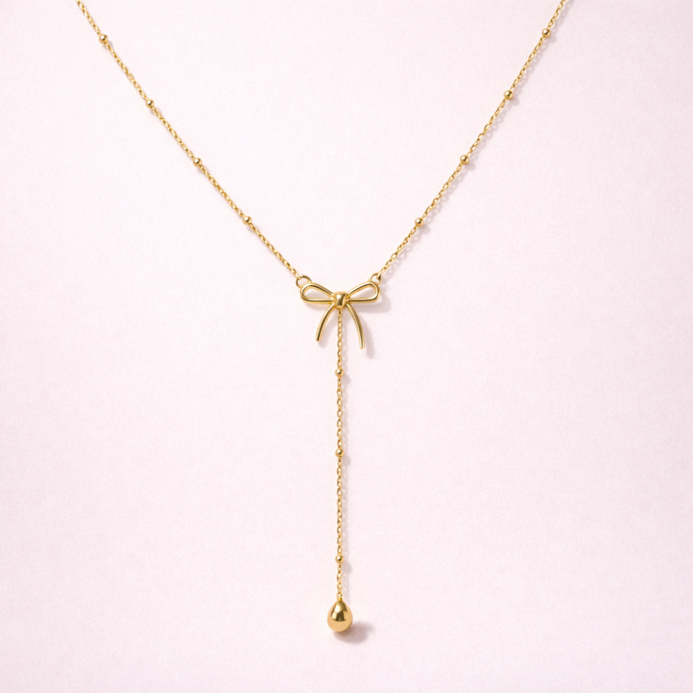 Collier Nœud Doré en forme T en acier inoxydable | Gaou Bijoux