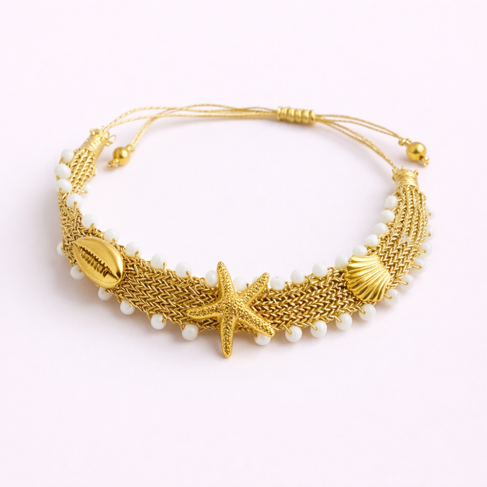 : Bracelet Océan Doré avec coquillages et perles blanches - bijoux acier inoxydable | Gaou Bijoux