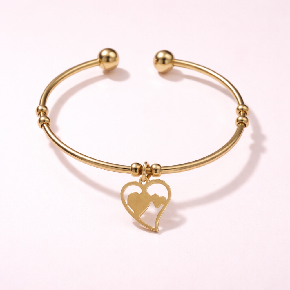 Bracelet jonc doré en acier inoxydable avec pendentif cœur